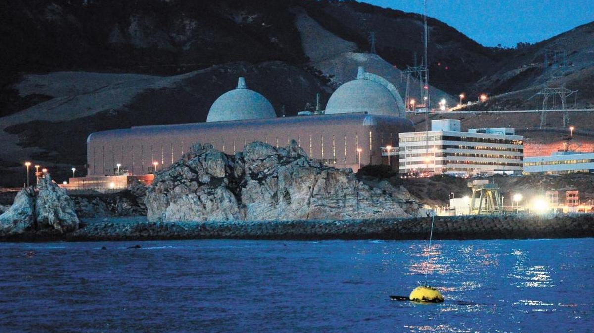 The Waverider Buoy floats in front of Diablo Canyon Power Plant at sunset. The buoy is maintained by PG&E and data from the buoy helps meteorologists such as John Lindsey predict weather.