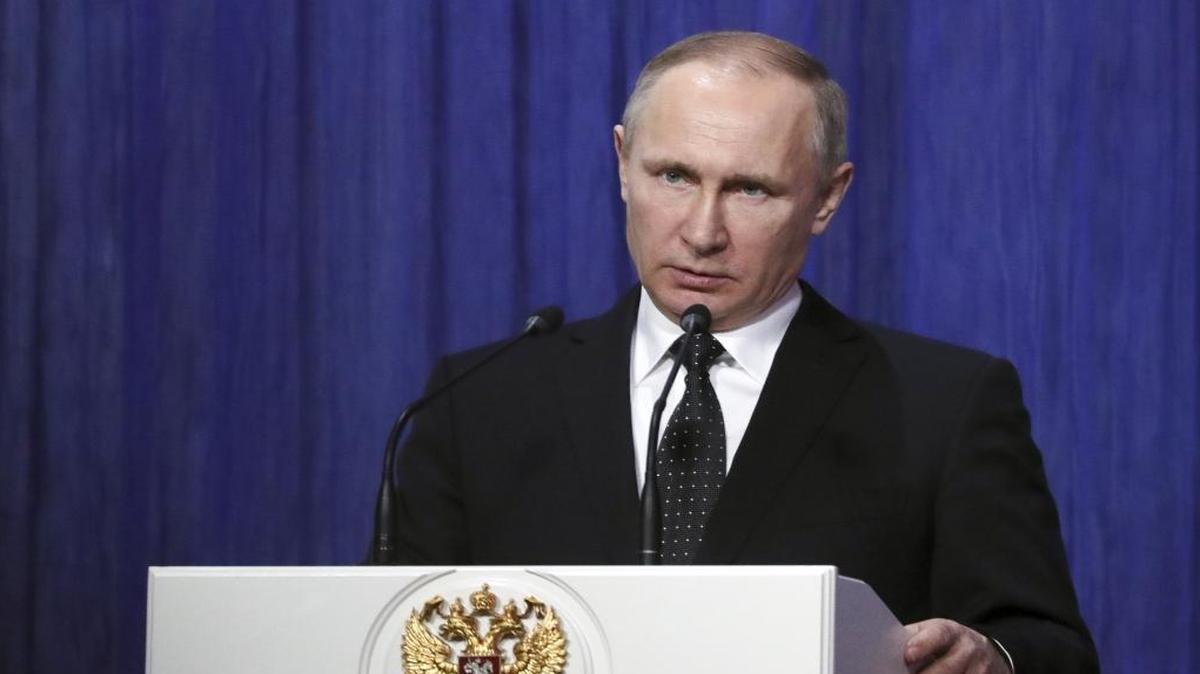 Russian President Vladimir Putin speaks during a meeting dedicated to the Day of Rosgvardia (National Guard) in the Kremlin in Moscow, Russia, Monday, March 27, 2017.