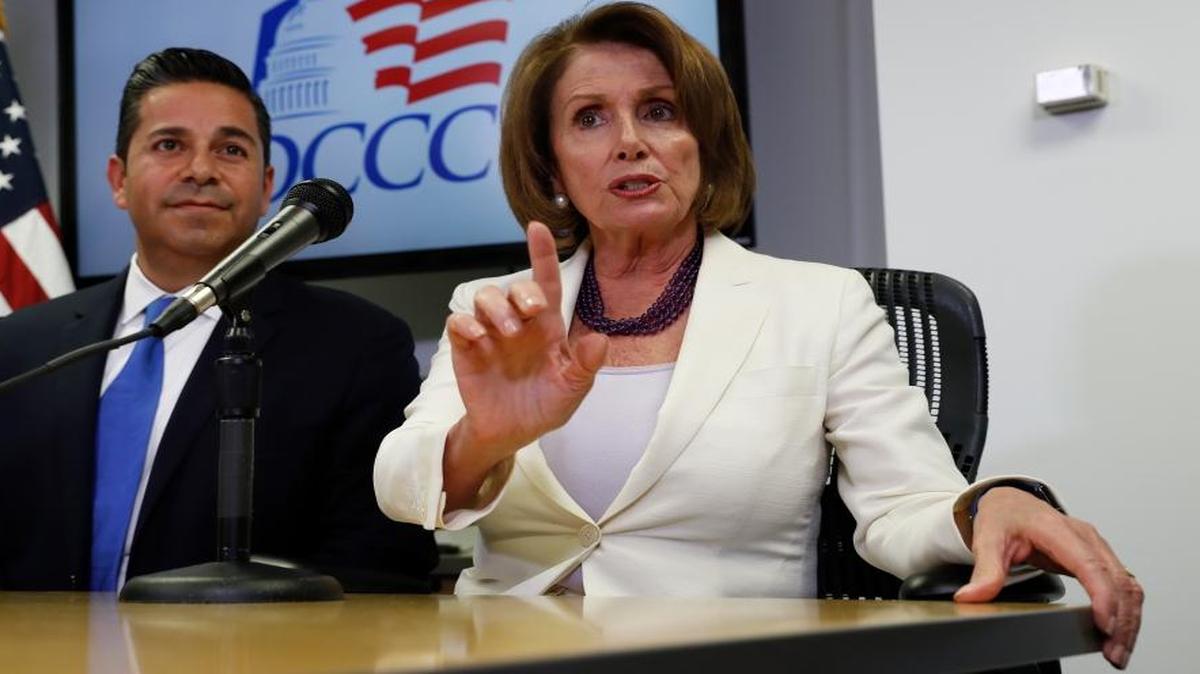 House Minority Leader Nancy Pelosi, joined by Democratic Congressional Campaign Committee Chairman Rep. Ben Ray Lujan, D-N.M., speaks during an Election Day news conference at the Democratic Congressional Campaign Committee Headquarters in Washington on Nov. 8.