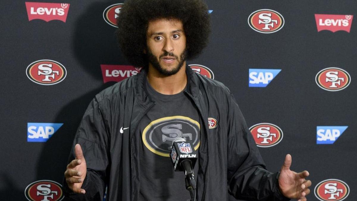 San Francisco 49ers quarterback Colin Kaepernick talks to the media at a news conference on Thursday, Sept. 1, 2016, in San Diego.