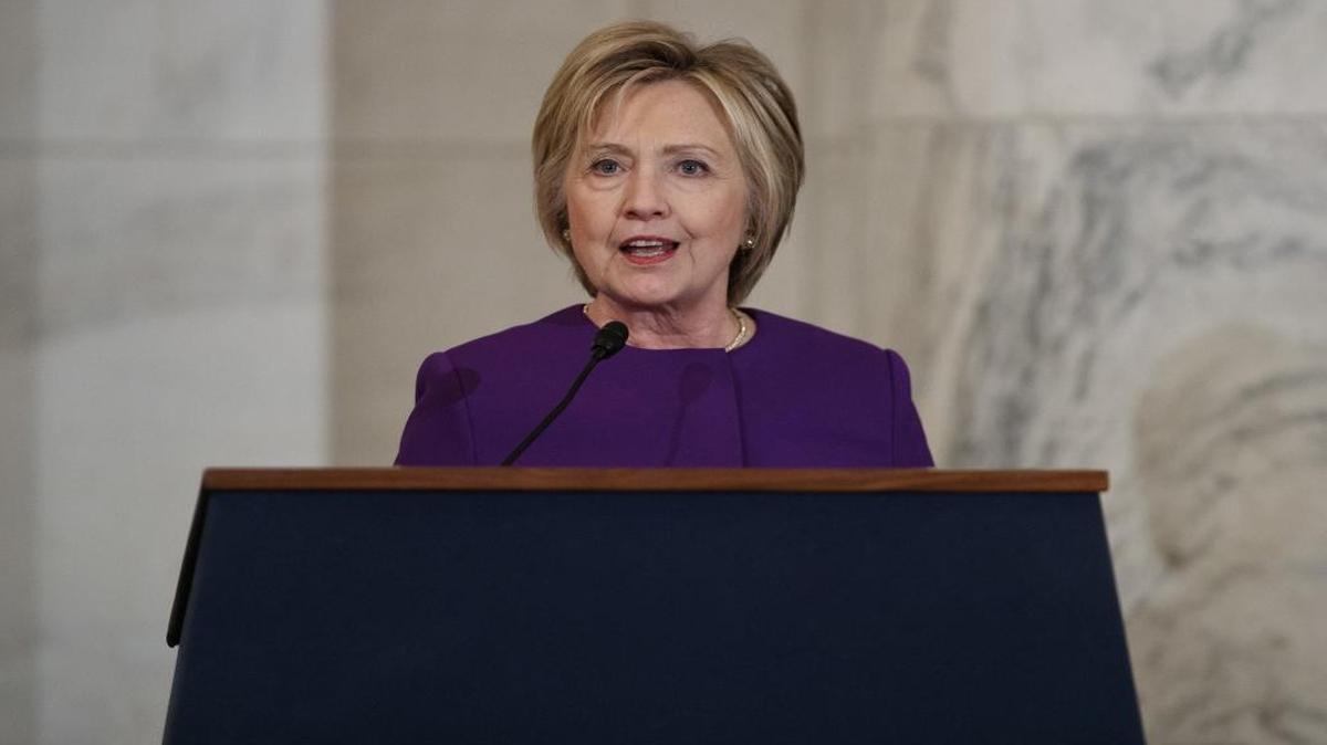 Former Secretary of State Hillary Clinton speaks during a ceremony to unveil a portrait of Senate Minority Leader Harry Reid, D-Nev., on Capitol Hill, Thursday, Dec. 8, 2016, in Washington.