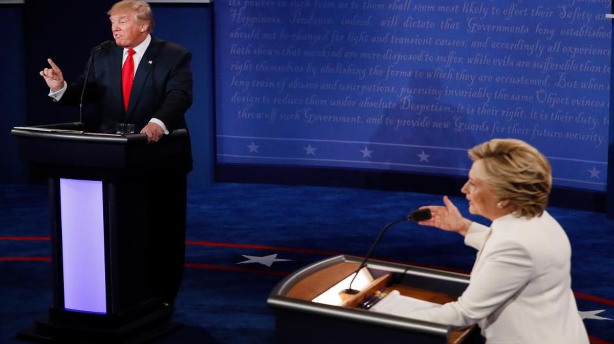 Democratic presidential nominee Hillary Clinton and Republican presidential nominee Donald Trump debate during the third presidential debate Oct. 19 at UNLV in Las Vegas.