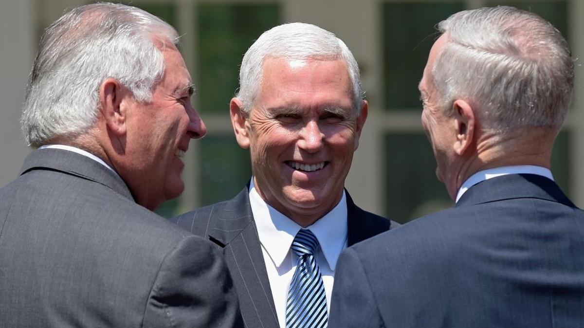 From left, Secretary of State Rex Tillerson, Vice President Mike Pence and Defense Secretary James Mattis talk in the Rose Garden of the White House in Washington, Friday, June 30, 2017, as they wait for President Donald Trump and South Korean President Moon Jae-in to make statements.