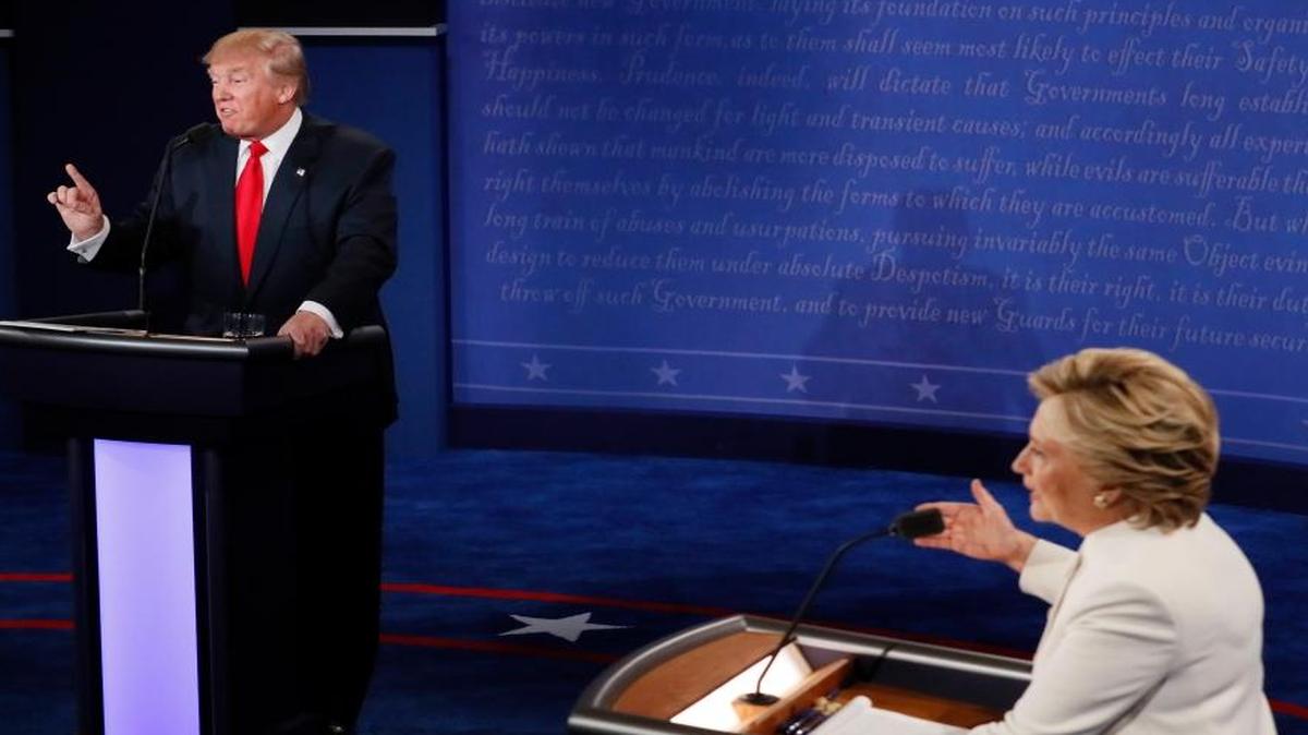 Democratic presidential nominee Hillary Clinton and Republican presidential nominee Donald Trump debate during the third presidential debate at UNLV in Las Vegas on Oct. 19. Headed for history books, the duel between Hillary Clinton and Donald Trump became a battle of “nasty women” and “bad hombres” vs. “deplorables” and voters who are “irredeemable.”