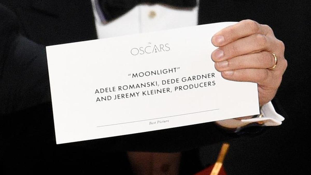 The envelope revealing “Moonlight” as the true winner of best picture is held up by “La La Land” producer Jordan Horowitz at the Oscars on Sunday, Feb. 26, 2017, at the Dolby Theatre in Los Angeles.