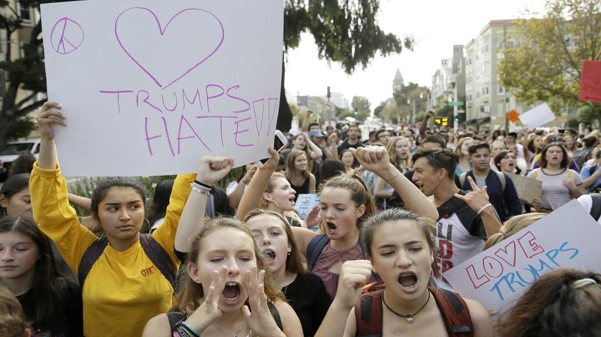 In this Thursday, Nov. 10, 2016, file photo, high school students protest in opposition of Donald Trump's presidential election victory in San Francisco.