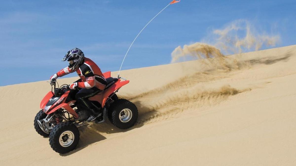 Nathan Sedlaczek, 13, rides a quad with his family at Oceano Dunes SRVA.