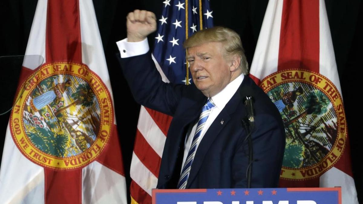 Republican presidential candidate Donald Trump pumps his fist after a campaign speech, Monday, Nov. 7, 2016, in Sarasota, Fla.