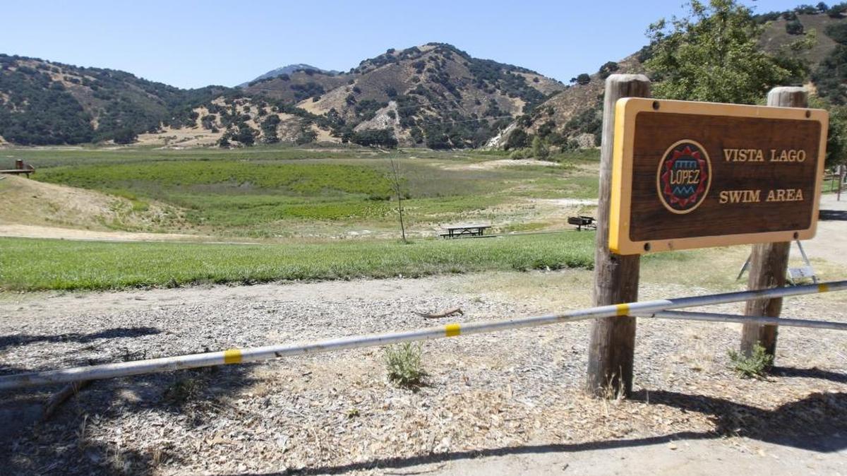 Lopez Lake levels fell this year despite the predected El Niño conditions. The Vista Del Lago swim area is high and dry.