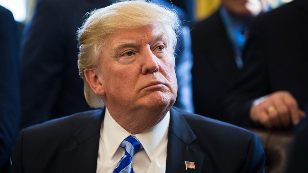 President Donald Trump sits in the Oval Office of the White House in Washington, D.C., on March 24, 2017.