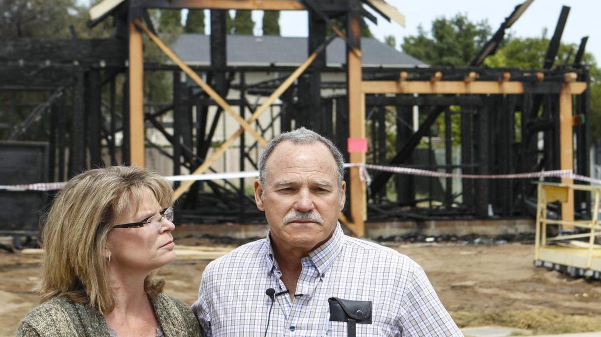 Donna and Greg France, farmers and project owners at the scene of Nipomo housing under construction intended for farmworkers. One house was struck by an arsonist, the fire department said, destroying one unit and damaging another.