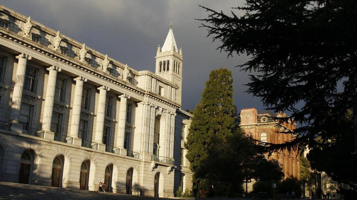 In this Dec. 21, 2014 file photo, late light falls on Wheeler Hall, South Hall and the Campanile on the University of California campus in Berkeley, Calif.