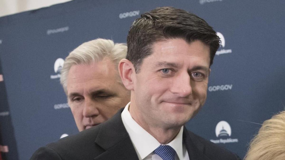 House Speaker Paul Ryan of Wis., accompanied by House Majority Leader Kevin McCarthy of Calif. leaves a news conference on Capitol Hill in Washington on Jan. 10.