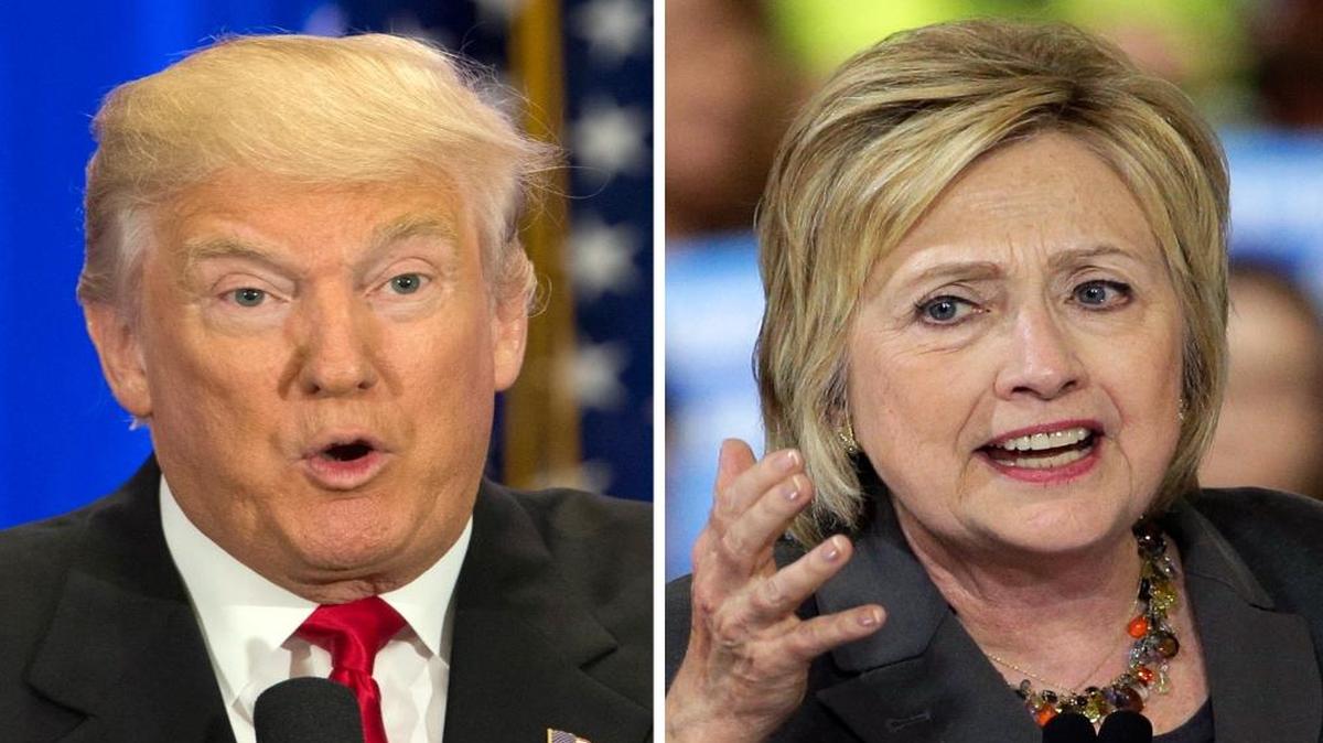 This photo combo of file images shows U.S. presidential candidates Donald Trump, left, and Hillary Clinton. Income inequality has been a rallying cry of the 2016 election, with more Americans turning fearful and angry about a shrinking middle class. Trump has pledged to restore prosperity by ripping up trade deals and using tariffs to return manufacturing jobs from overseas. Clinton has backed a debt-free college option and higher minimum wages to help the middle class.
