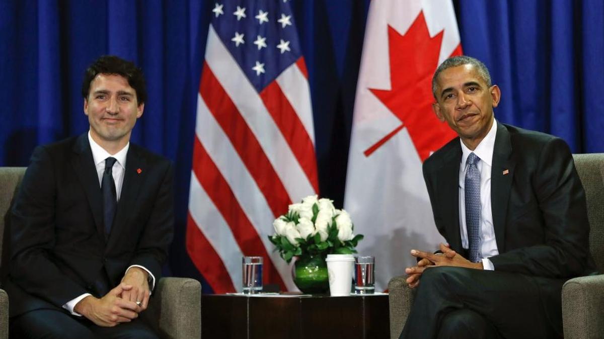 U.S. President Barack Obama, right, sits with Canada’s Prime Minister Justin Trudeau during their meeting at the Asia-Pacific Economic Cooperation (APEC), in Lima, Peru, Sunday, Nov. 20, 2016.