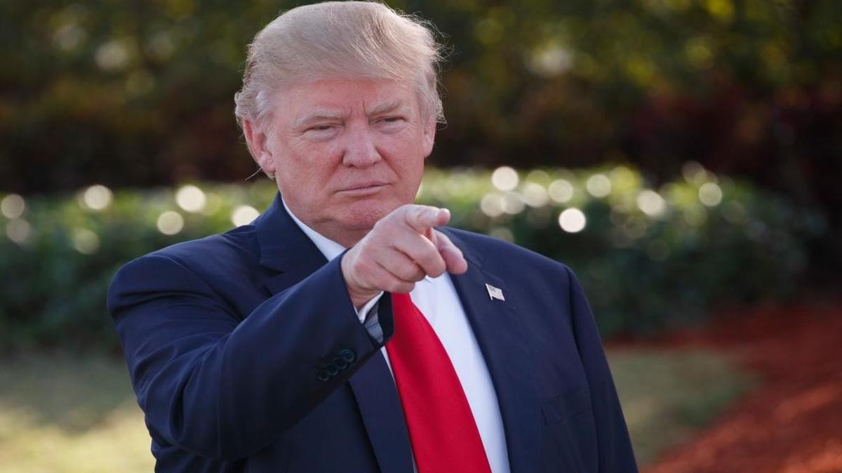 Donald Trump points Tuesday toward guests during an campaign event with employees at Trump National Doral in Miami.