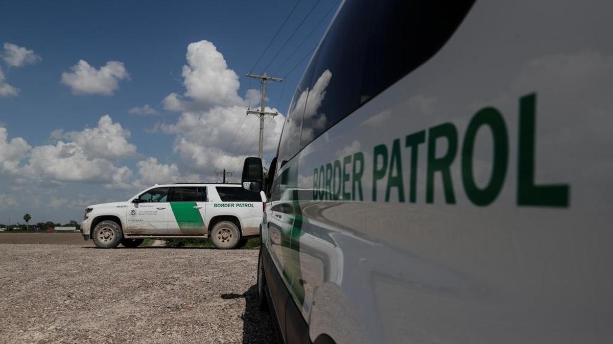 Border patrol vehicles parked on a levy near the Rio Grande, where they constantly patrol for people illegally crossing into the U.S. from Mexico, on June 25, 2018.