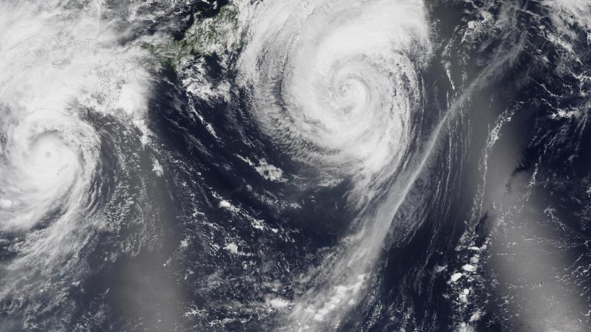 This natural-color image mosaic, provided by NASA, taken in Aug. 2015, based on data collected during two orbital passes of the Visible Infrared Imaging Radiometer Suite (VIIRS) shows typhoons in the western North Pacific.