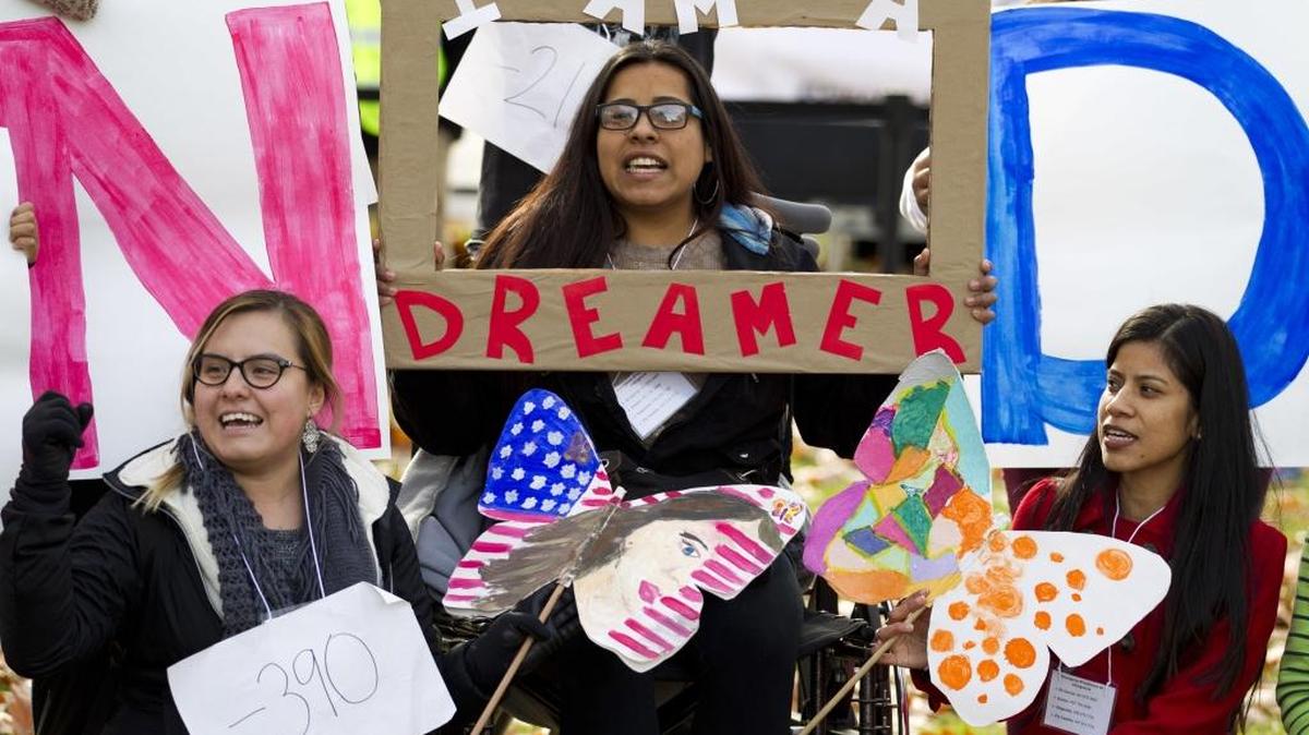 Demonstrators chant slogans during an immigration rally in support of the Deferred Action for Childhood Arrivals (DACA), and Temporary Protected Status (TPS), programs, on Capitol Hill in Washington, Wednesday, Dec. 6, 2017.