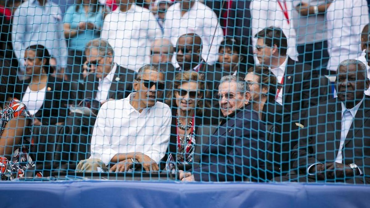 President Barack Obama and Cuban President Raul Castro take their seats before a baseball game between the Tampa Bay Rays and the Cuban national team in Havana, Cuba.