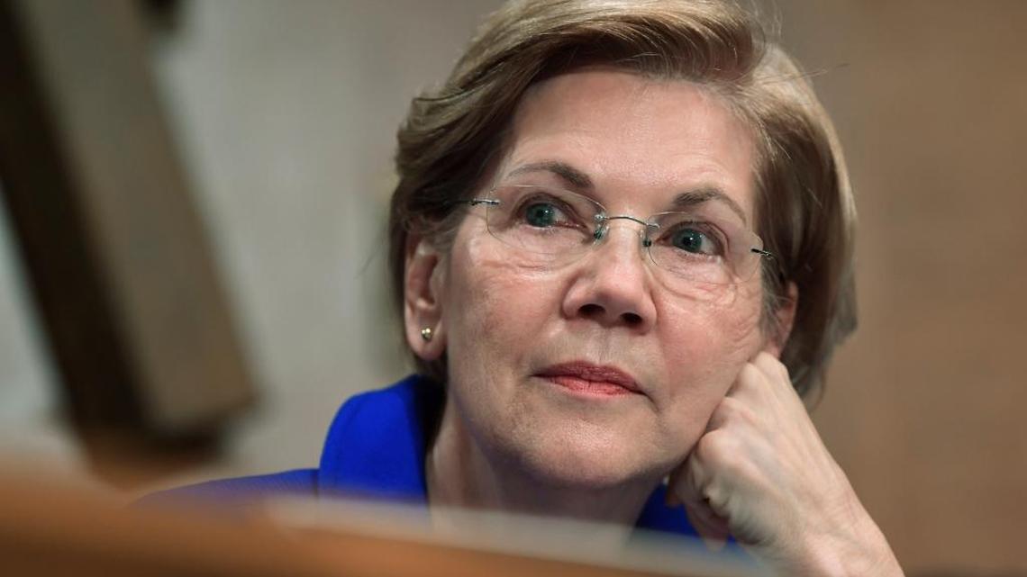 In this Dec. 5, 2017, file photo, Sen. Elizabeth Warren, D-Mass., waits to speak during a meeting of the Senate Banking Committee on Capitol Hill in Washington.