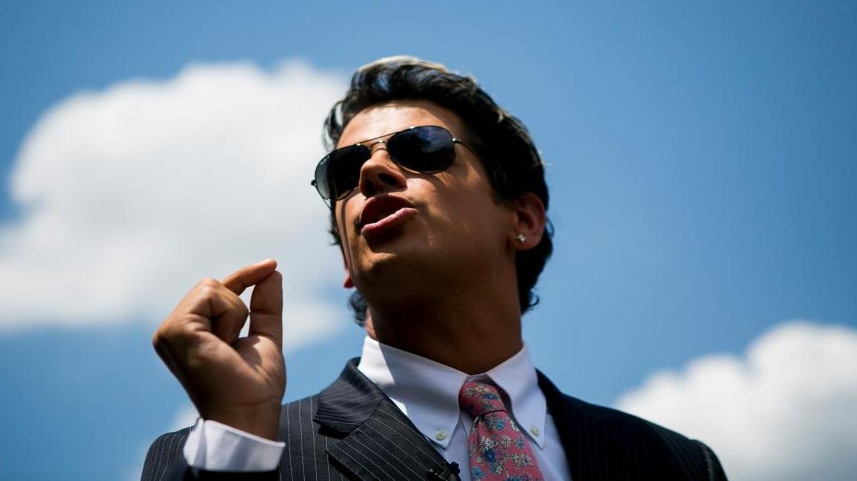 Milo Yiannopoulos, a technology editor at the conservative news site Breitbart, speaks near the Pulse nightclub after the mass shooting there, in Orlando, June 15, 2016.