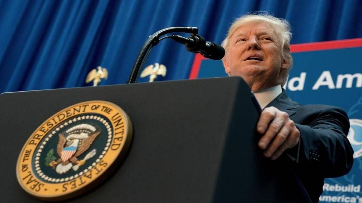 In this Friday, June 9, 2017, photo, President Donald Trump speaks on infrastructure at the Department of Transportation in Washington.