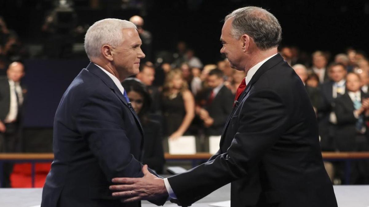 Republican vice-presidential nominee Gov. Mike Pence and Democratic vice-presidential nominee Sen. Tim Kaine shake hands after the vice-presidential debate at Longwood University in Farmville, Va., on Oct. 4.