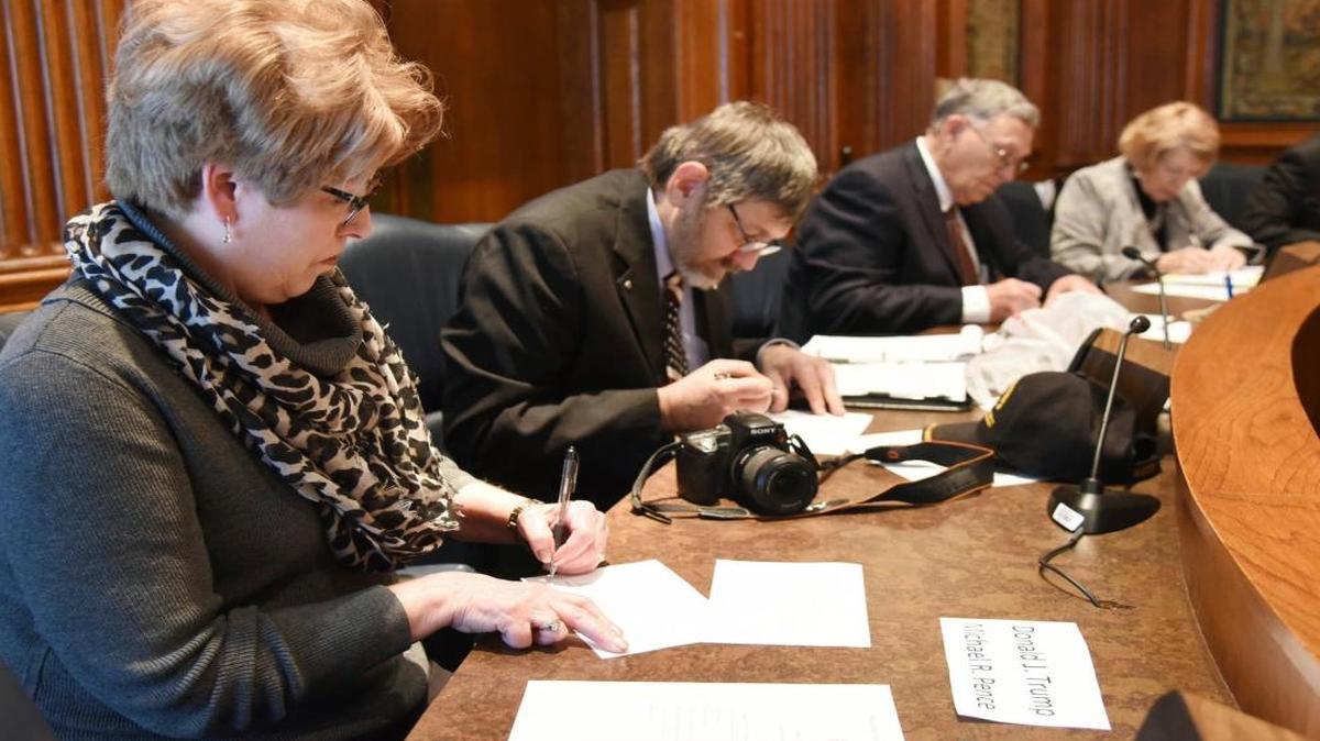 Electoral College members vote at the state Capitol in Jefferson City, Mo., on Dec. 19, 2016. All 10 of Missouri’s electors cast their votes Monday for Republican President-elect Donald Trump, affirming the results of the statewide election.