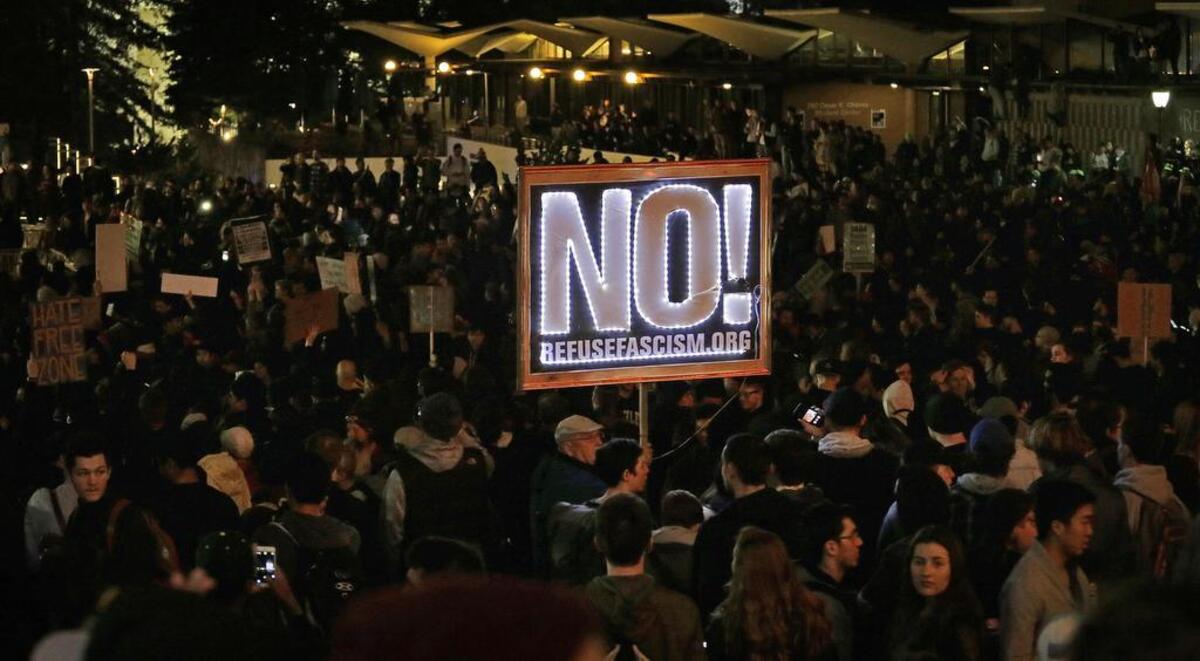 Protestors against a scheduled speaking appearance by polarizing Breitbart News editor Milo Yiannopoulos fill Sproul Plaza on the UC Berkeley campus on Wednesday, Feb. 1, 2017, in Berkeley. The event was canceled out of safety concerns after protesters hurled smoke bombs, broke windows and started a bonfire.