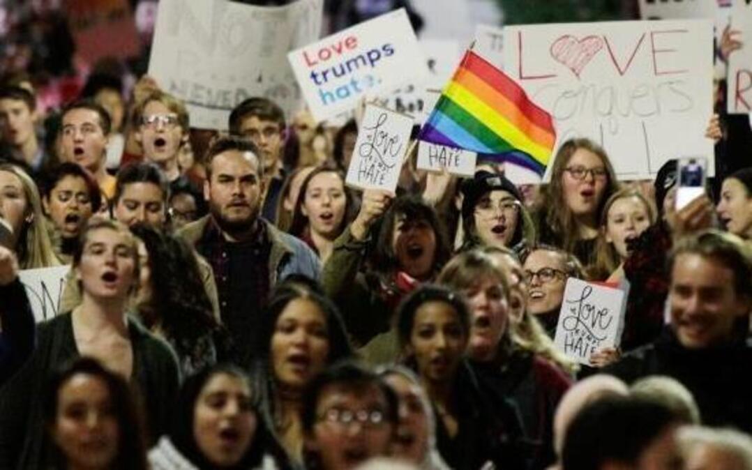 A few thousand protesters march through Library Mall from UW-Madison’s Bascom Hall to the State Capitol, protesting President-elect Donald Trump on Thursday, Nov. 10, 2016, in Madison, Wis.