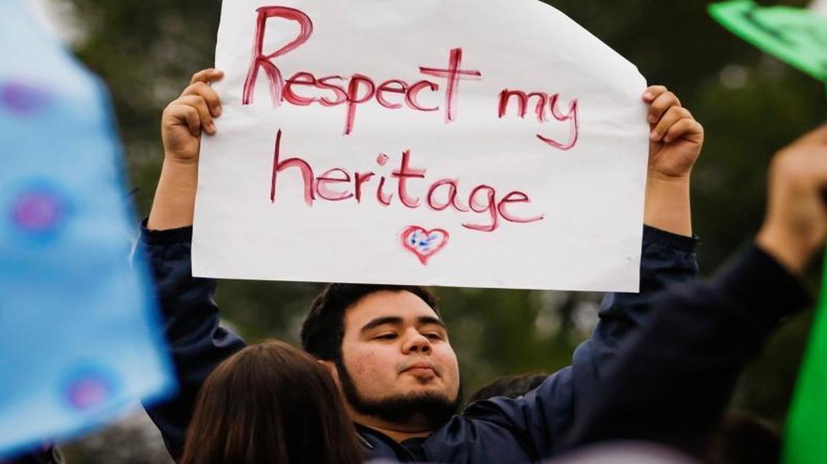 About 150 Paso Robles High School students held a demonstration at the edge of campus Thursday, Feb. 16, 2017, as part of “A Day Without Immigrants.”