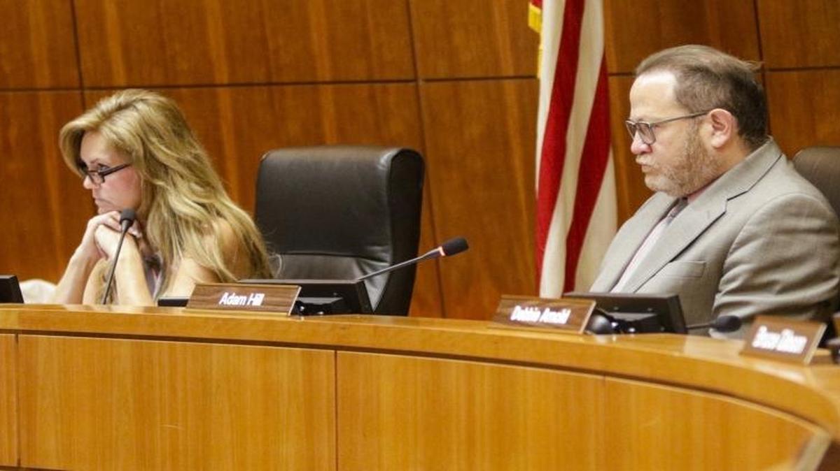 From left, supervisors Lynn Compton, Adam Hill and Debbie Arnold listen at a Board of Supervisors meeting in 2017.