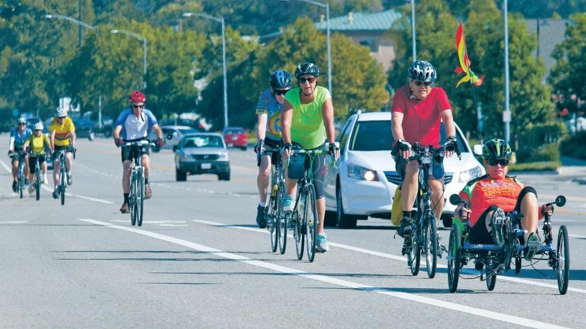 Members of the Tortoise group of the SLO Bicycle Club take a ride along Broad Street in July 2015.