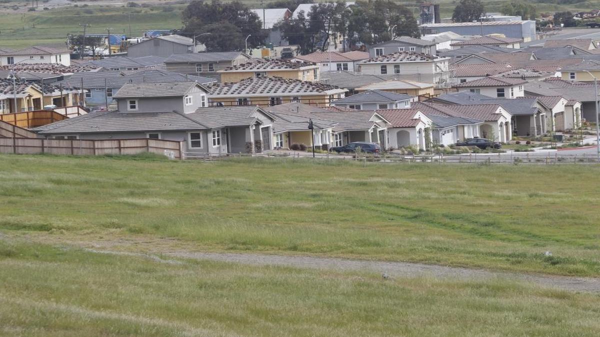 In an effort to spur construction of more housing like this project in San Luis Obispo, the state can now penalize cities that fall behind in meeting housing goals.