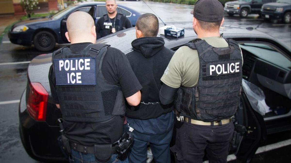In this photo taken Feb. 7, 2017, released by U.S. Immigration and Customs Enforcement, an arrest is made during a targeted enforcement operation conducted by U.S. Immigration and Customs Enforcement (ICE) aimed at immigration fugitives, re-entrants and at-large criminal aliens in Los Angeles.