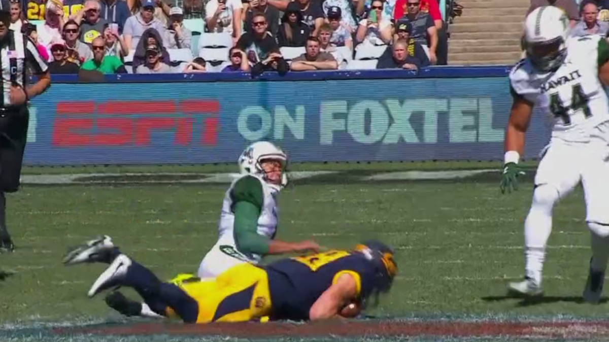 Cal running back and Mission Prep graduate Patrick Larid falls on a onside kick during the season opener against Hawaii.