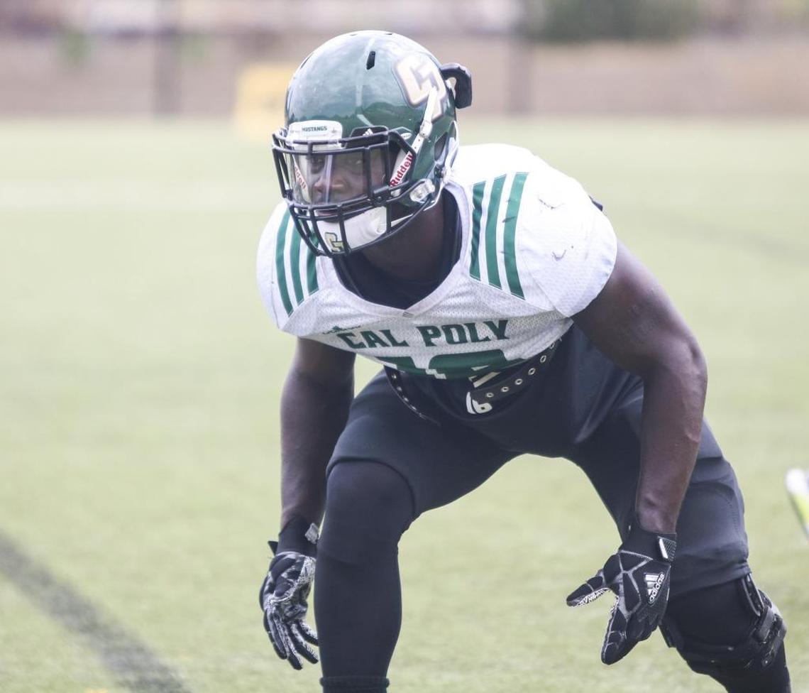 Cal Poly senior linebacker Charlie Davis runs through drills during fall camp.