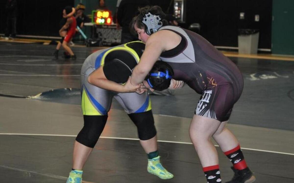 Nipomo’s Alexis Garcia takes on Elizabeth Manzano of Fillmore in the championship match at the CIF Southern Section Northern Regional on Saturday. Garcia won by fall at 1 minute, 30 seconds.