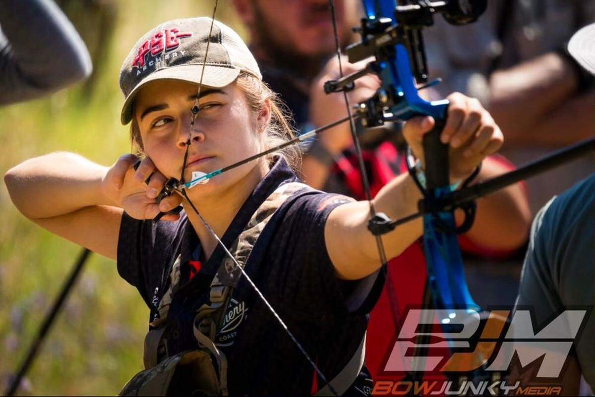 Bella Otter fires off an arrow. The 18-year-old Atascadero resident and Cuesta College student has won state and national tournaments.