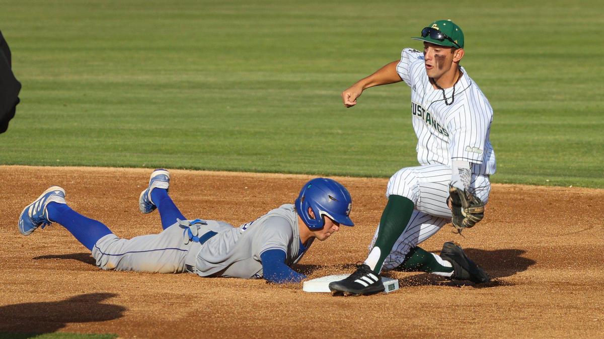 Bryce Willits is safe on a pickoff at second as Brooks Lee fields the throw. Cal Poly lost to UCSB 7-10 in an 11 inning game April 29, 2022.