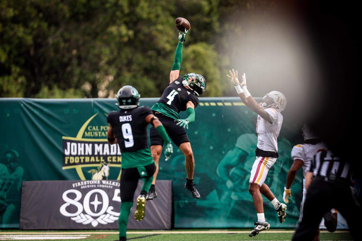 Cal Poly Mustangs cornerback Kai Rapolla breaks up a pass in the first half. The Cal Poly football team beat Lincoln 41-20 at home on Sept. 16, 2023. 