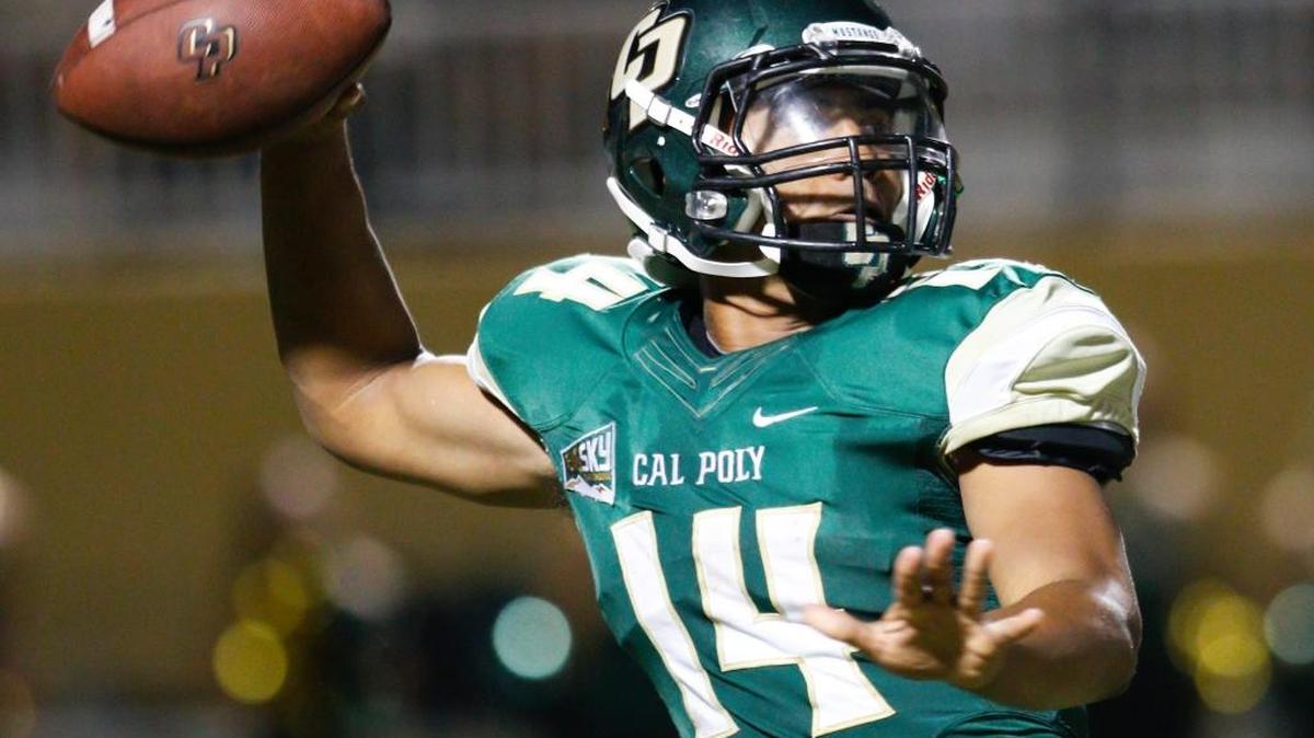 Kahaleel Jenkins throws a pass late in the second quarter after Portland State took the lead. Cal Poly fell to Portland State at home by three points.