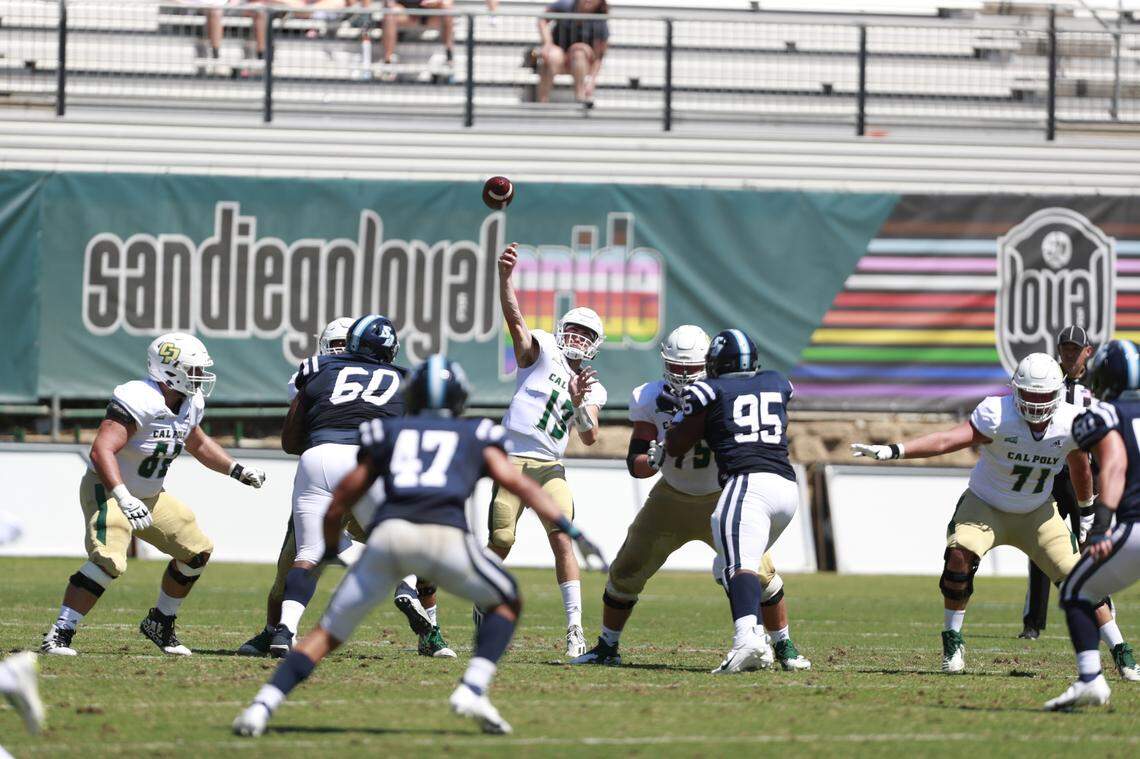 Quarterback Spencer Brasch fires a pass during Cal Poly’s 28-17 win over the University of San Diego on Sept. 3, 2021. Brasch threw for 318 yards and two touchdowns.