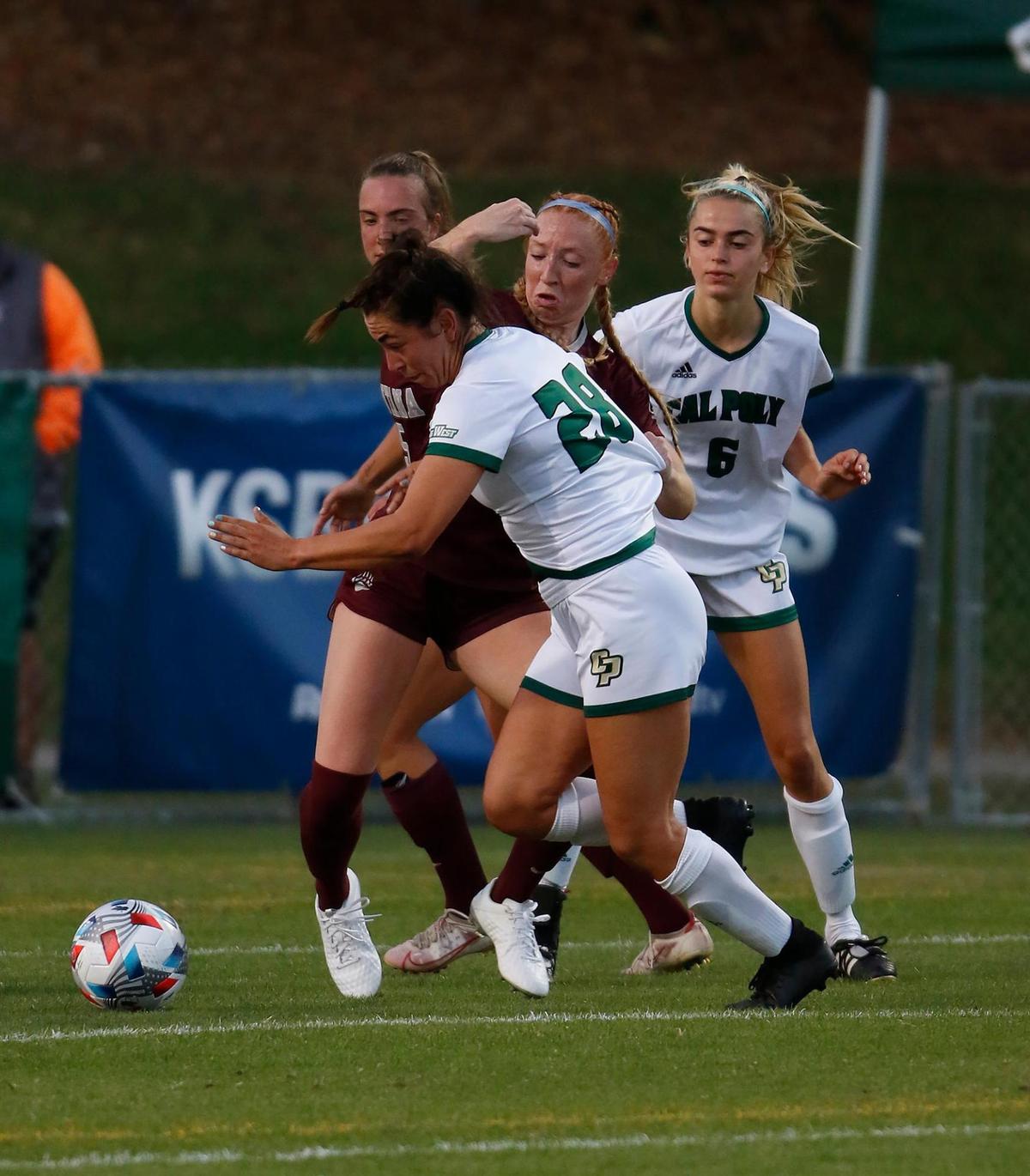 Cal Poly’s Olivia Ortiz (28), a SLO High grad, defends against Montana’s players. The Cal Poly women’s soccer team beat Montana 2-1 on Thursday, Aug. 26, 2021, at Alex G. Spanos Stadium in San Luis Obispo.