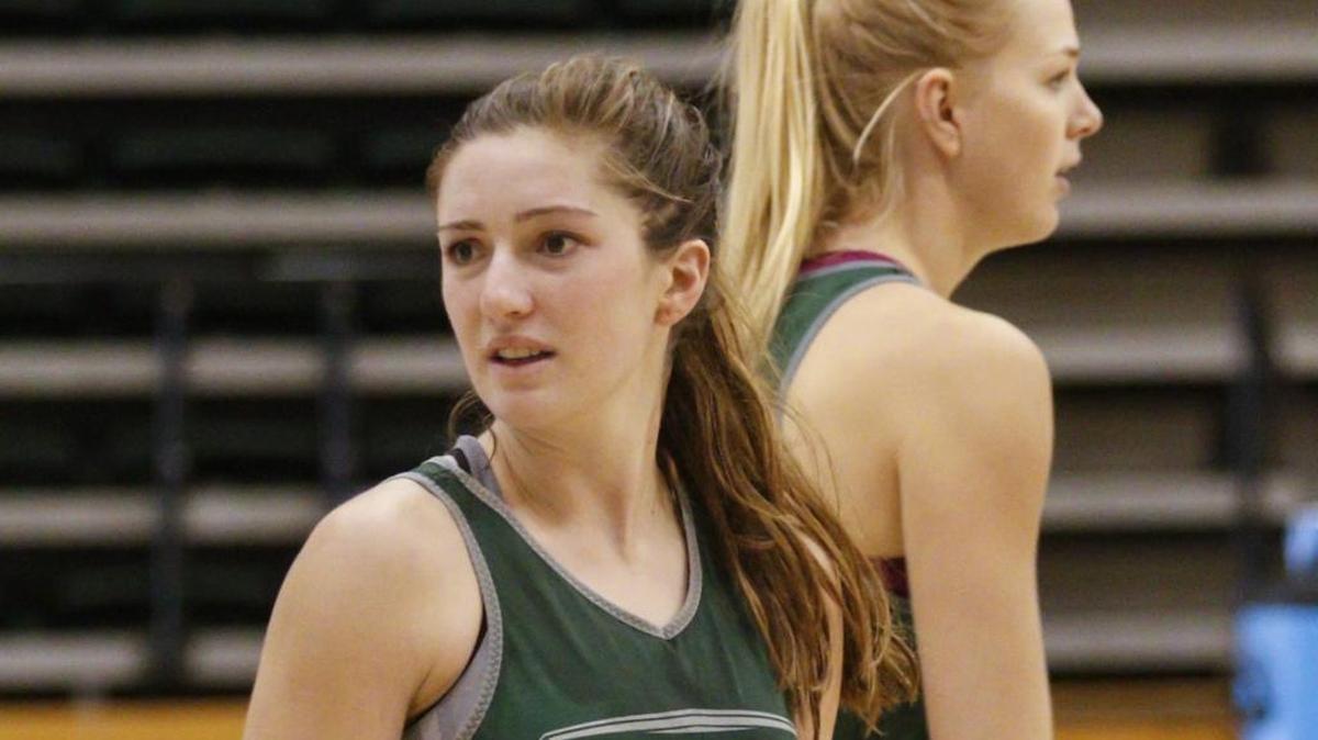 Senior Beth Balbierz, left, and junior Hannah Gilbert practice Wednesday to prepare for Friday’s season opener.