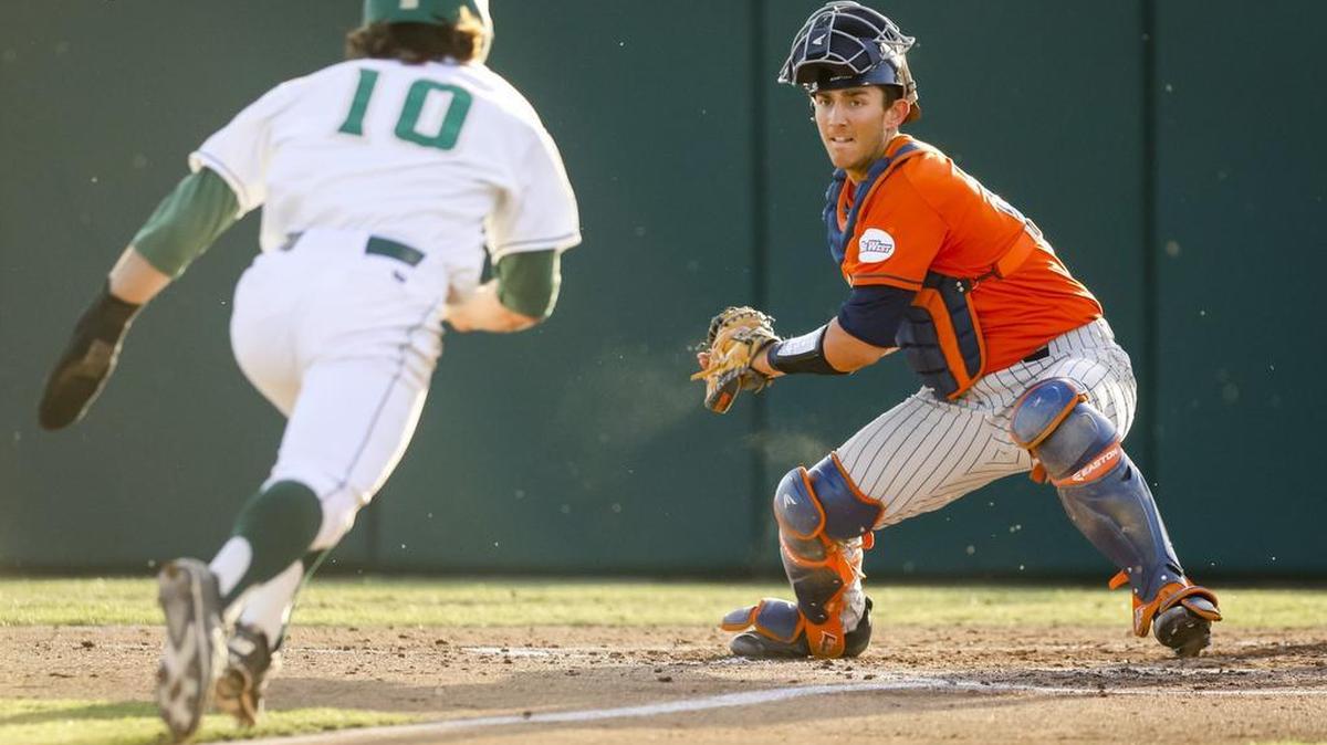 Colby Barrick gets ready to slide into home plate during Cal Poly’s 7-4 loss to Cal State Fullerton in a Big West Conference baseball series Friday at Baggett Stadium.