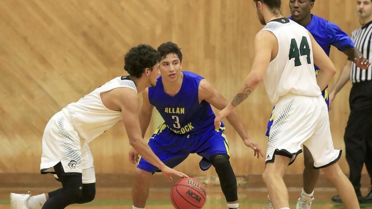 Cuesta College plays its final game against Allan Hancock College on Wednesday. Allan Hancock's Matt Willkomm (3) guards Cuesta’s Daniel Solis (3) during first half play.