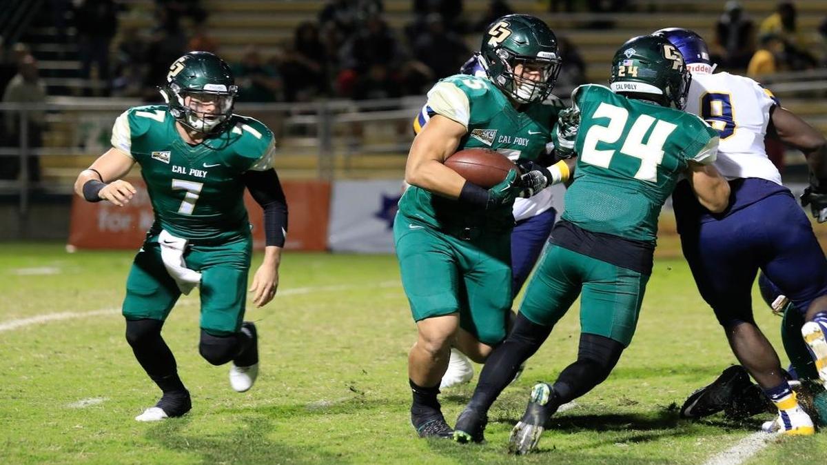 Cal Poly fullback Joe Protheroe, center, was one of 10 Mustangs who received all-Big Sky Conference recognition on Tuesday. Quarterback Dano Graves, left, and running back Kori Garcia, right, also were all-conference performers.
