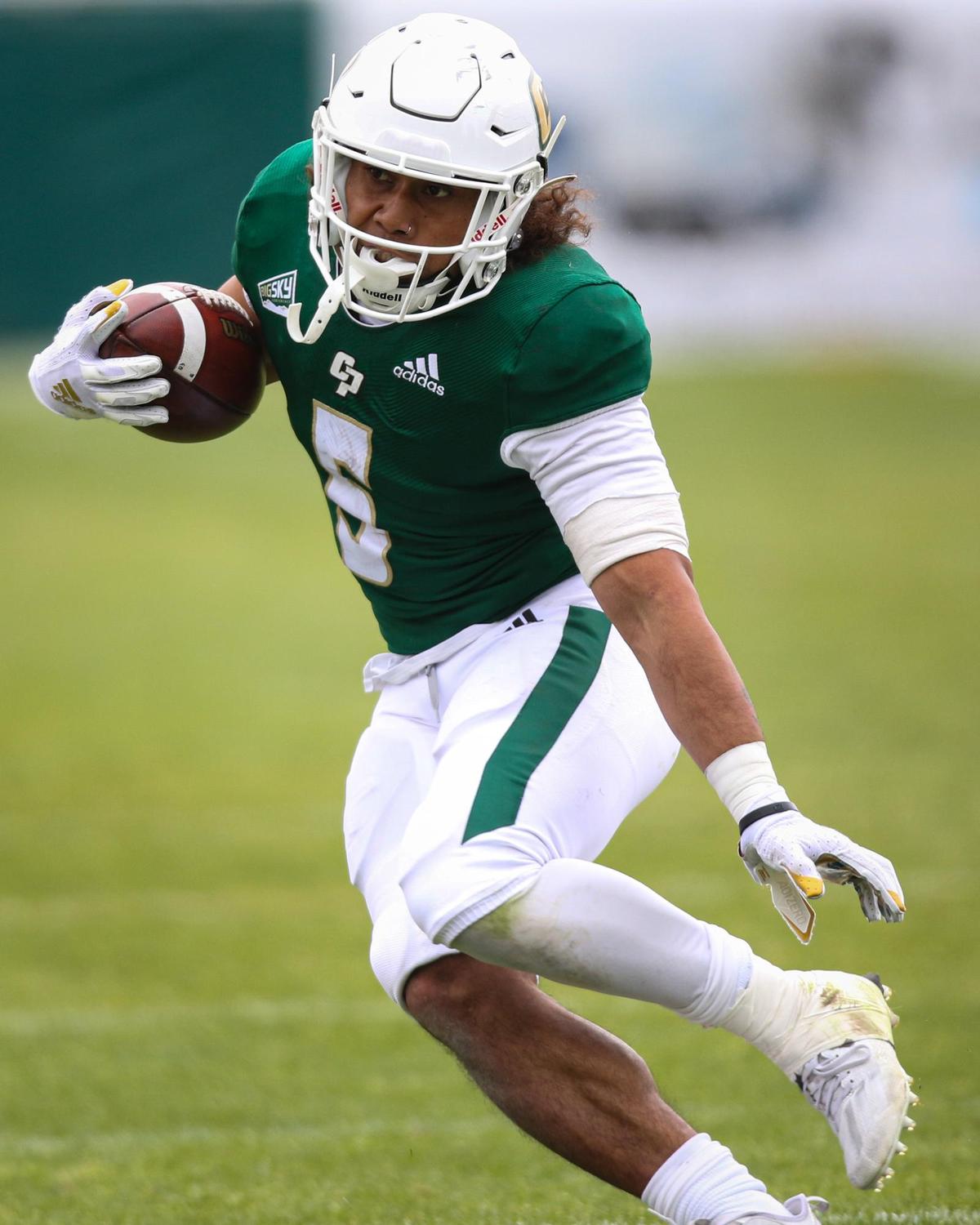 Lepi Lataimua runs. Cal Poly hosted Southern Utah in the first football game of the season. Alex G. Spanos stadium had no spectators due to coronavirus restrictions Saturday March. 13, 2021.
